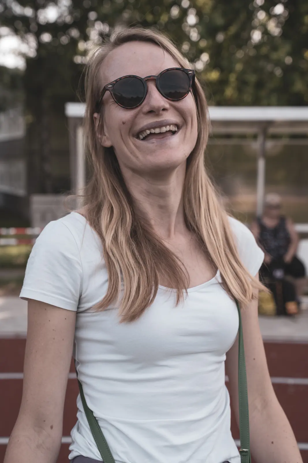 Úsmev počas portrétneho fotenia